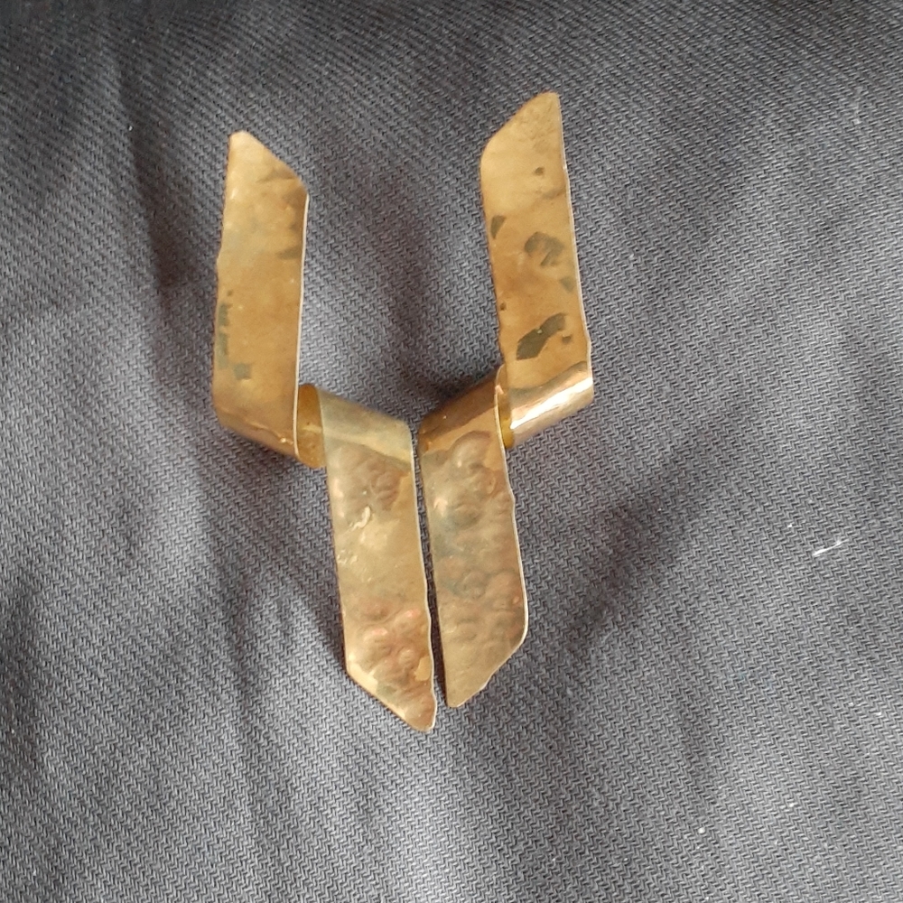 Handmade hammered brass ribbon like earrings.